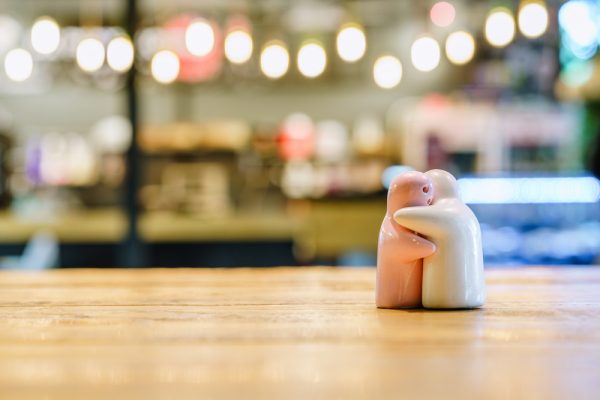 Ceramic,Couple,Dolls,Hugging,On,The,Floor,With,Decorative,Indoor